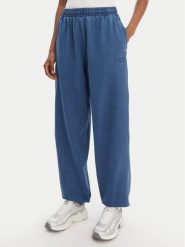 Reebok Spodnie dresowe Tenley RK25488CCW Niebieski Regular Fit. Niebieskie spodnie dresowe damskie Reebok, bez wzorów, z bawełny. Za 299.99 zł.