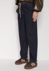 Niebieskie Bawełniane Jeansy o Szerokim Kroju z Wysokim Stanem ze Sznurkiem Carmencita. Niebieskie jeansy damskie Born2be, bez wzorów, z bawełny, z podwyższonym stanem. Za 99.99 zł.