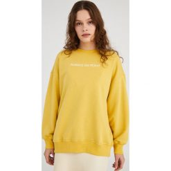 Żółta bluza oversize BLUZA DAMSKA. Żółte bluzy damskie Ryłko, l, bez wzorów, z bawełny, bez ramiączek, bez kaptura. W wyprzedaży za 129.99 zł.
