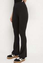 Czarne Spodnie Prążkowane Dzwony z Wysokim Stanem Areliva. Czarne spodnie materiałowe damskie Born2be, bez wzorów, z jeansu, eleganckie, z podwyższonym stanem. Za 39.99 zł.