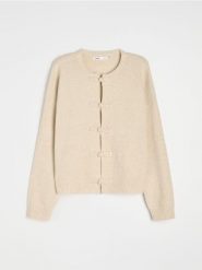 Kardigan oversize z pętelkowym zapięciem - kremowy. Białe kardigany damskie Sinsay, l, bez wzorów, bez kołnierzyka. Za 49.99 zł.