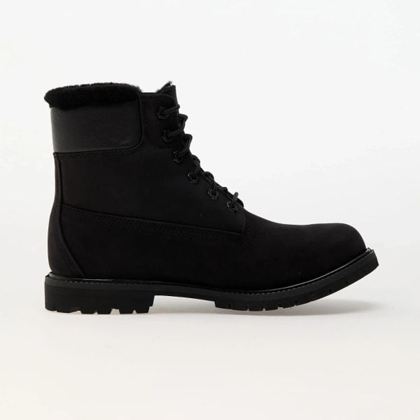 TIMBERLAND 6 Inch Warm Lined Waterproof Boot Trapery damskie. Czarne trapery damskie Timberland, z gumy, bez zapięcia. Za 909.99 zł.