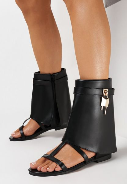 Czarne Sandały z Wywiniętą Zasuwaną Cholewką Panisse. Czarne sandały damskie Born2be, bez wzorów, bez obcasa, na płaskiej podeszwie, bez zapięcia. Za 159.99 zł.