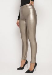 Złote Legginsy z Ekoskóry z Wysokim Stanem i Imitacją Kieszeni Merievia. Żółte legginsy damskie Born2be, bez wzorów, z jeansu. Za 39.99 zł.