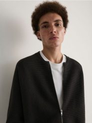 Rozpinany sweter - ciemnoszary. Szare swetry męskie Reserved, l, bez wzorów, z bawełny, bez kołnierzyka, bez ramiączek. W wyprzedaży za 79.99 zł.
