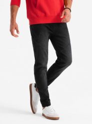 Męskie jeansowe joggery z asymetrycznymi przeszyciami – czarne V3 OM-PADJ-0165 - XXL. Czarne spodnie materiałowe męskie Ombre Clothing, z aplikacjami, z bawełny. Za 113.99 zł.