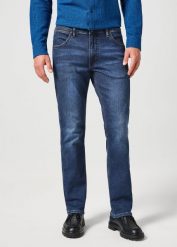 WRANGLER MĘSKIE SPODNIE JEANSOWE GREENSBORO OUTLAW INDIGO 112360405 W15Q008826. Niebieskie jeansy męskie Wrangler, z jeansu. Za 229.99 zł.