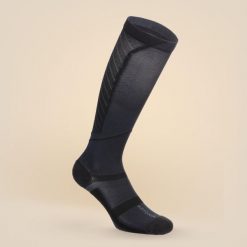Skarpety kompresyjne Aptonia. Czarne skarpetki damskie Decathlon, bez wzorów, z bawełny. Za 69.99 zł.