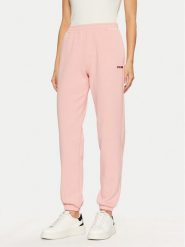 Guess Spodnie dresowe V5RB02 KCLD1 Różowy Regular Fit. Czerwone spodnie dresowe damskie Guess, z aplikacjami, z dresówki. Za 179.99 zł.