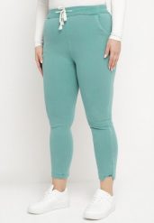 Jasnozielone Spodnie Skinny ze Sznurkiem w Pasie i Kieszeniami Irfana. Zielone spodnie materiałowe damskie Born2be, bez wzorów, z jeansu, eleganckie. Za 49.99 zł.