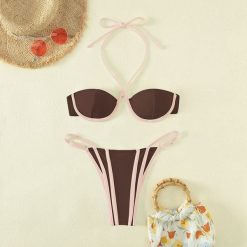 Bikini na szyję z regulowanymi zapięciami plażowe Corene. Białe bikini Intica, m, bez wzorów, z materiału. Za 149.00 zł.