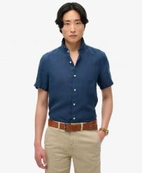 Superdry Vacation Linen S/S Koszula lniana 100% NAVY. Niebieskie koszule męskie Superdry, na lato, m, bez wzorów, eleganckie, bez kołnierzyka, bez ramiączek. Za 277.00 zł.