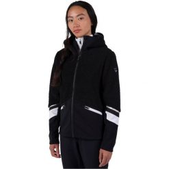 Kurtka narciarska damska z pełnym zamkiem z polaru Rossignol Wispile. Czarne kurtki sportowe damskie Rossignol, na zimę, bez wzorów, z polaru, bez ramiączek, z kapturem, narciarskie. Za 625.50 zł.