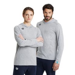Bluza Arena Team Long Sleeve T-Shirt Panel z kapturem. Szare bluzy damskie ARENA, bez wzorów, z bawełny, sportowe, bez ramiączek, z kapturem. Za 149.99 zł.
