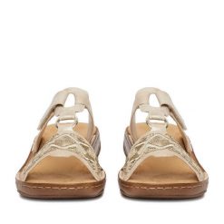 Klapki Rieker. Żółte klapki damskie Rieker, bez wzorów, bez obcasa, bez zapięcia. Za 289.99 zł.