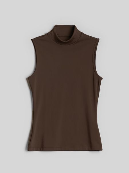 4F Top slim gładki damski - brązowy XS. Brązowe topy damskie 4F, m, bez wzorów, z dzianiny, klasyczne, bez kołnierzyka, bez ramiączek. Za 69.99 zł.