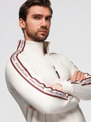 Męska bluza rozpinana z lampasami i wysoką stójką – kremowa V2 - Rozmiar: S. Białe bluzy sportowe męskie Ombre Clothing, m, bez wzorów, z bawełny, bez kaptura. Za 209.99 zł.