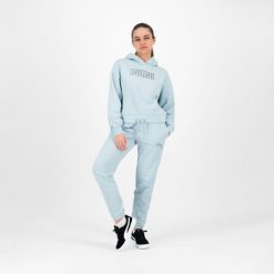 Spodnie dresowe damskie Puma Gym & Pilates. Niebieskie spodnie dresowe damskie Puma, bez wzorów, z bawełny, sportowe, na fitness i siłownię. W wyprzedaży za 89.99 zł.