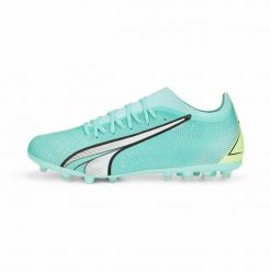 Buty sportowe dla dorosłych do gry w piłkę Ultra Match Mg. Zielone buty sportowe męskie Puma, bez wzorów, bez zapięcia, do piłki nożnej. Za 270.30 zł.
