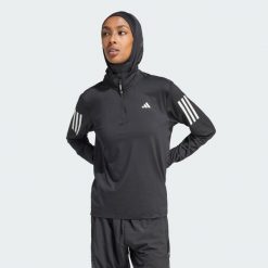 Kurtka Own the Run Half-Zip. Czarne kurtki sportowe damskie Adidas, s, bez wzorów, z materiału, bez ramiączek, bez kaptura, do biegania. Za 219.00 zł.