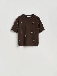 Sweter z błyszczącą aplikacją - brązowy. Brązowe swetry nierozpinane damskie Reserved, l, z aplikacjami, z dzianiny, bez kołnierzyka, bez ramiączek. Za 119.99 zł.
