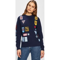 Calvin Klein Jeans - Sweter. Niebieskie swetry nierozpinane damskie Calvin Klein Jeans, m, z aplikacjami, z bawełny, bez kołnierzyka, bez ramiączek. W wyprzedaży za 299.90 zł.