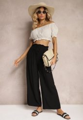 Czarne Spodnie z Bawełny Typu Palazzo High Waist z Gumką w Talii Nelsaria. Czarne spodnie materiałowe damskie Renee, bez wzorów, z bawełny, eleganckie, z podwyższonym stanem. Za 39.99 zł.