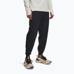 Spodnie do biegania męskie Under Armour Trail Run. Czarne spodnie sportowe męskie Under Armour, m, bez wzorów, do biegania. Za 259.99 zł.