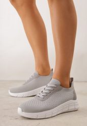 Szare Minimalistyczne Buty Sportowe z Siateczki na Tłoczonej Podeszwie Zanera. Szare obuwie sportowe damskie Born2be, bez wzorów, z jeansu, bez zapięcia, na fitness i siłownię. Za 79.99 zł.