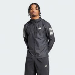 Kurtka Own The Run. Niebieskie kurtki męskie Adidas, l, bez wzorów, bez kaptura, do biegania. Za 349.00 zł.