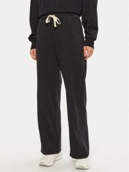 Champion Spodnie dresowe 117638 Czarny Wide Leg. Czarne spodnie dresowe damskie Champion, bez wzorów, z bawełny. Za 139.99 zł.