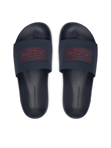 Tommy Hilfiger Klapki Patch Pool Slide FM0FM06008 Granatowy. Niebieskie klapki męskie Tommy Hilfiger, bez wzorów, ze skóry, bez zapięcia. Za 189.99 zł.