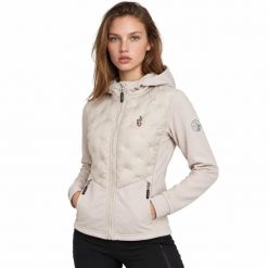 Kurtka turystyczna hybrydowa damska VOLTA. Niebieskie kurtki sportowe damskie Aulp, l, bez wzorów, z elastanu, bez ramiączek, trekkingowe. Za 539.99 zł.