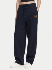 Tommy Hilfiger Spodnie dresowe Logo Exaggerated Seam WW0WW50783 Granatowy Relaxed Fit. Niebieskie spodnie sportowe damskie Tommy Hilfiger, bez wzorów, z bawełny. Za 649.99 zł.
