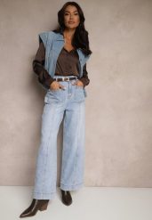 Jasnoniebieskie Jeansy Szerokie z Bawełną i Wiskozą High Waist z Przeszyciami Rivionis. Niebieskie jeansy damskie Renee, bez wzorów, z bawełny, eleganckie, z podwyższonym stanem. Za 99.99 zł.