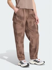Adidas Spodnie outdoor Terrex Xploric Clima365 KH2594 Brązowy Loose Fit. Brązowe spodnie sportowe damskie Adidas, bez wzorów, z syntetyku, sportowe, outdoorowe. Za 438.99 zł.