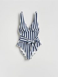 Jednoczęściowy strój kąpielowy - granatowy. Niebieskie stroje kąpielowe damskie Reserved, bez wzorów. Za 129.99 zł.