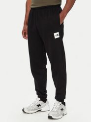 The North Face Spodnie dresowe Box Half Dome NF0A8JB0 Czarny Regular Fit. Czarne spodnie sportowe męskie The North Face, m, bez wzorów, z bawełny. Za 279.99 zł.