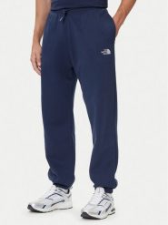 The North Face Spodnie dresowe Essential NF0A8C1F Granatowy Relaxed Fit. Niebieskie spodnie sportowe męskie The North Face, m, bez wzorów, z dresówki. Za 299.99 zł.
