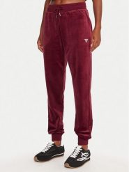 Guess Spodnie dresowe V3BB27 K0232 Bordowy Regular Fit. Czerwone spodnie dresowe damskie Guess, z aplikacjami, z dresówki. Za 259.99 zł.