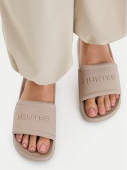 Hunter Klapki CEO-3C048 Beżowy. Brązowe klapki damskie Hunter, bez wzorów, z syntetyku, bez obcasa, bez zapięcia. Za 119.99 zł.