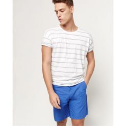 O'Neill Summer Szorty Niebieski. Niebieskie szorty męskie O'Neill, bez wzorów, z bawełny. Za 180.95 zł.