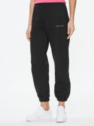 Tommy Jeans Spodnie dresowe Classics DW0DW17309 Czarny Relaxed Fit. Czarne spodnie dresowe damskie Tommy Jeans, bez wzorów, z bawełny. Za 249.99 zł.