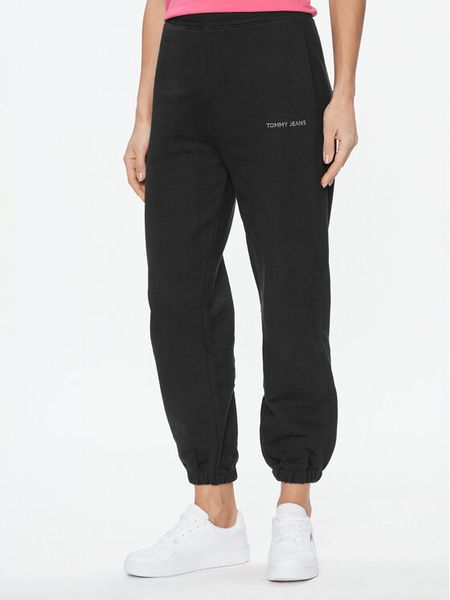 Tommy Jeans Spodnie dresowe Classics DW0DW17309 Czarny Relaxed Fit. Czarne spodnie dresowe damskie Tommy Jeans, bez wzorów, z bawełny. Za 249.99 zł.