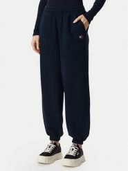 Tommy Jeans Spodnie dresowe Badge DW0DW23536 Granatowy Regular Fit. Niebieskie spodnie dresowe damskie Tommy Jeans, bez wzorów, z bawełny. Za 329.99 zł.