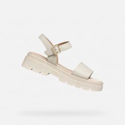 Sandały GEOX D ADACTER S Beżowy. Brązowe sandały damskie Geox, bez wzorów, ze skóry, bez obcasa, bez zapięcia. Za 401.99 zł.