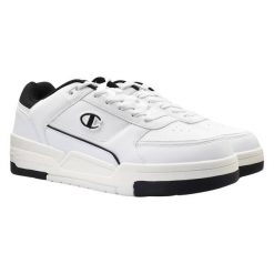 Męskie Buty Sportowe RD18 Heritage Low Cut. Białe buty sportowe męskie Champion, bez wzorów, bez obcasa, bez zapięcia. Za 278.99 zł.