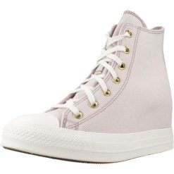 Buty CONVERSE CHUCK TAYLOR ALL STAR WEDGE Fioletowy. Fioletowe obuwie sportowe damskie Converse, bez wzorów, z tkaniny, bez zapięcia. Za 388.99 zł.