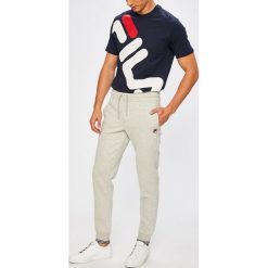 Fila - Spodnie. Szare spodnie sportowe męskie Fila, l, bez wzorów, z bawełny, climacool (adidas). W wyprzedaży za 179.90 zł.