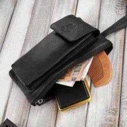 Paolo Peruzzi Saszetka męska skórzana do ręki czarna T-90-BL. Czarne saszetki i nerki męskie Paolo Peruzzi, bez wzorów. Za 155.19 zł.